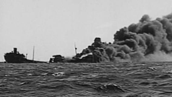 An allied merchant ship is sunk by a German U-boat